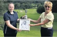  ??  ?? Abigail McCoy presented with the trophy by Frances Gell
