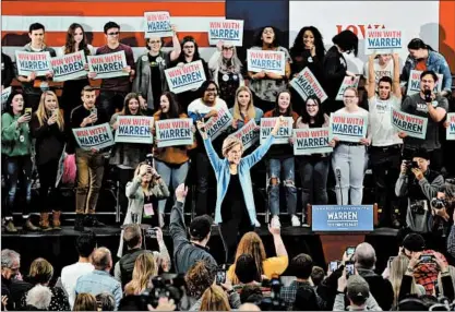  ?? JOHN J. KIM/CHICAGO TRIBUNE PHOTOS ?? Presidenti­al candidate Sen. Elizabeth Warren takes the stage for a campaign event at Coe College on Saturday in Cedar Rapids, Iowa.