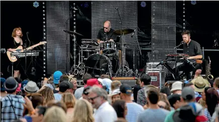  ?? PHOTOS: ALDEN WILLIAMS/FAIRFAX NZ ?? One among many acts, Pacific Heights performs at the Electric Avenue music festival in Christchur­ch’s Hagley Park on Saturday.