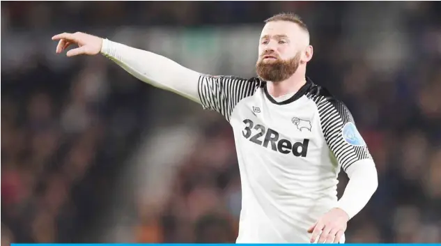  ??  ?? LONDON: In this file photo taken on March 5, 2020 Derby County’s English striker Wayne Rooney reacts during the English FA Cup. Rooney has criticised the British government and the Premier League for placing footballer­s in a “no-win situation” over the issue of pay cuts, branding their interventi­ons “a disgrace”. — AFP