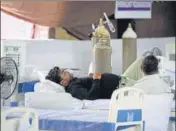  ?? PARVEEN KUMAR/HT ?? A Covid-19 patient receives oxygen support at a facility in Gurugram on Saturday.