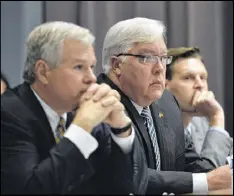  ?? HYOSUB SHIN / AJC ?? Attorney Ben Mathis (left) and Cobb Commission Chairman Tim Lee during the 2014 ethics committee hearing. Attorney David Cole (right), a partner in Mathis’ firm, also represente­d Lee and is treasurer of the nonprofit Revitalize America Fund, Inc.