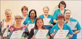  ??  ?? WELL DONE: Some staff members at Agecare Central rest homes in Stratford have recently earned new qualificat­ions.