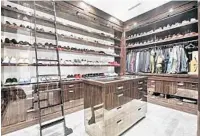  ?? PHOTOS BY DOUGLAS ELLIMAN REAL ESTATE/COURTESY ?? The exterior includes a 170,000-gallon saltwater swimming pool, grotto and rock wall. The master wing includes a closet designed to replicate a Chanel boutique, as well as a gentleman’s closet dedicated to the owner’s $100,000 collection of Air Jordan...