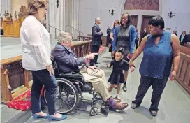  ?? [MARK BURNS/OFFICE OF GEORGE H.W. BUSH/POOL VIA AP] ?? Former President George H.W. Bush greets the mourners with his daughter Dorothy “Doro” Bush Koch during the visitation for former first lady Barbara Bush, Friday at St. Martin’s Episcopal Church in Houston. Barbara Bush died Tuesday at the age of 92.