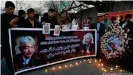  ??  ?? A vigil was held after a Japanese doctor was gunned down in Afghanista­n