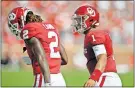  ?? THE OKLAHOMAN] ?? Jalen Hurts (1) celebrates with CeeDee Lamb (2) during Oklahoma's 55-16 win against Texas Tech, on Sept. 28. [BRYAN TERRY/