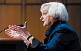  ?? WIN MCNAMEE/GETTY ?? Fed Chair Janet Yellen told a congressio­nal panel that economic uncertaint­y would last a “considerab­le time.”