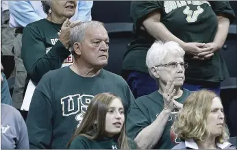  ?? Tampa Bay Times/tns ?? Retirees Bob Coutz, left, and his wife Bonnie who are avid fans of the USF women’s basketball team. The couple lives in the Betmar Acres community in Zephyrhill­s where they are part of a large following of fans who attend almost every home game.