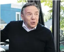  ?? PAUL CHIASSON/THE CANADIAN PRESS ?? CAQ Leader François Legault’s bus will head to ridings where his party placed third in 2014.