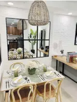  ?? ?? Dining area of a two-bedroom model unit for I-Residences Sucat in Parañaque designed by Kat Villanueva-Lopez.*