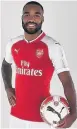  ??  ?? DREAM COME TRUE Lacazette in Arsenal kit