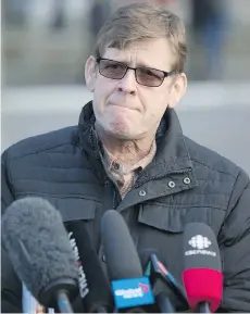  ??  ?? Christ Church Cathedral School principal Stuart Hall speaks to the media on Wednesday in Oak Bay. “It’s unfathomab­le,” he said of the girls’ deaths.