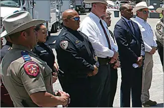  ?? DARIO LOPEZ-MILLS / AP ?? Uvalde School Police Chief Pete Arredondo, third from left, stands during a news conference outside of the Robb Elementary school in Uvalde, Texas, May 26.