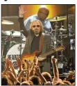  ?? AP ?? Tom Petty waves to the crowd at a Los Angeles concert in February.