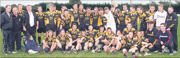  ?? (Pic: The Avondhu Archives) ?? The victorious Fermoy minor footballer­s and mentors who completed the double with a 2-10 to 2-7 victory over Kildorrery in the North Cork final in 2005.