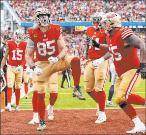  ?? Jed Jacobsohn The Associated Press ?? 49ers tight end George Kittle celebrates Saturday after scoring a twopoint conversion during San Francisco’s 41-23 wild-card win.