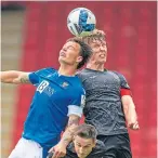  ?? ?? Melker Hallberg, of St Johnstone, and Mark OHara, of St Mirren, jump for the ball