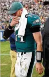  ?? KEVORK DJANSEZIAN / GETTY IMAGES ?? Philadelph­ia quarterbac­k Carson Wentz was able to walk off the field but is reported to have a torn left ACL.