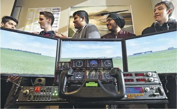  ?? ED KAISER ?? J. Percy Page High School has been offering its new ground-based aviation course for high-school students since Feb. 22. The Catholic district, meanwhile, is exploring its own aviation course in partnershi­p with Mount Royal University and WestJet.