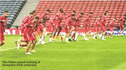  ??  ?? The Malta squad training at Hampden Park yesterday