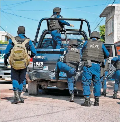  ?? DANY BÉJAR ?? Integrante­s de las Fuerzas de Seguridad Pública del Estado.