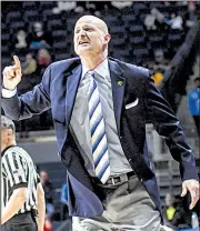  ?? AP/The Oxford Eagle/BRUCE NEWMAN ?? Mississipp­i Coach Andy Kennedy gives instructio­ns to his team against Missouri on Feb. 6 in Oxford, Miss. Kennedy, whose Rebels take on Arkansas tonight, announced Monday that he is stepping down effective at the end of this season.