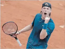  ?? ALESSANDRA TARANTINO THE ASSOCIATED PRESS ?? Denis Shapovalov celebrates his win over John Millman of Australia.