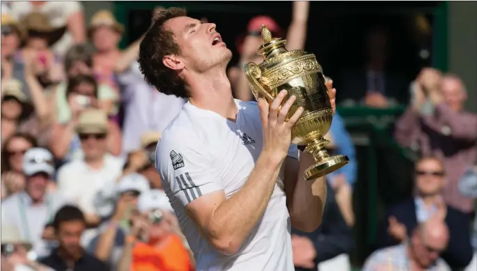  ??  ?? Above: Delight and relief are etched on Andy Murray face as he holds the Wimbledon’s men’s singles trophy in 2013 after a straight-sets victory over Novak Djokovic. The Scot’s triumph ended Britain’s 77-year wait for a men’s champion.