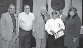  ?? Photo submitted ?? U.S. Army Veteran Ronnie Harrison of Siloam Springs was honored with the Medal of Patriotism at the Cherokee Nation’s March Tribal Council Meeting. Harrison is a member of Siloam Springs VFW Post 1674. Pictured, from left, are Cherokee Nation Deputy...