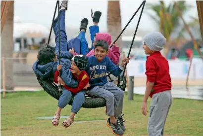  ??  ?? The UAE topped the happiness report in many indicators, such as the suitabilit­y of a country for foreign arrivals and their employment.