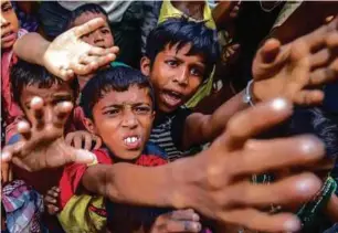  ??  ?? Anak yatim piatu paling teruk kerana mereka tiada bapa ketika melarikan diri ke Bangladesh dari barat Rakhine.