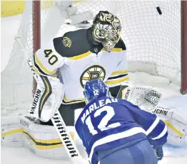  ??  ?? Maple Leafs centre Patrick Marleau fires a shot past Bruins goaltender Tuukka Rask during the third period in Toronto.