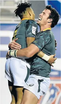  ?? Picture: GALLO IMAGES ?? GLARING ABSENCE: Blitzbok Ruhan Nel, right, seen here with teammate Selvyn Davids after scoring a try against Australia during the 2018 HSBC USA Sevens clash in Las Vegas, last week. Nel was sidelined by injury in the Vancouver leg on Sunday