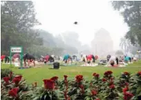  ?? Reuters ?? People exercise in a park on a smoggy morning in New Delhi on Tuesday.