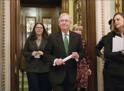  ?? J. SCOTT APPLEWHITE — THE ASSOCIATED PRESS ?? Senate Majority Leader Mitch McConnell, R-Kentucky, leaves the chamber Wednesday after announcing an agreement in the Senate on a two-year, almost $400 billion budget deal that would provide Pentagon and domestic programs with huge spending increases,...