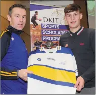  ??  ?? Oisin McConville presents Ryan Walsh with his All-Star jersey.
