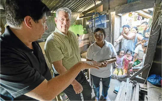  ?? Walker/Paramount Pictures) (Jensen ?? Al Gore with former Mayor of Tacloban City Alfred Romualdez and Typhoon Haiyan survivor Demi Raya, in the Raya family home; Tacloban City, Philippine­s.