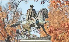  ?? STEVE HELBER, AP ?? Fall leaves frame a statue of Confederat­e Maj. Gen. J.E.B. Stuart on Monument Avenue in Richmond, Va. Likenesses of Thomas “Stonewall” Jackson, left, and Robert E. Lee stand in Wyman Park in Baltimore.