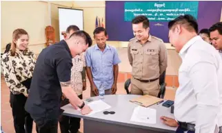  ?? BANTEAY SREI DISTRICT ADMINISTRA­TION ?? Banteay Srei district governor Khim Finan (fifth from left).