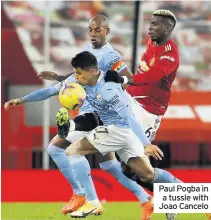  ??  ?? Paul Pogba in a tussle with Joao Cancelo