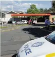  ??  ?? Patrols Police guard the scene at St Leonards Square near to where a man was stabbed