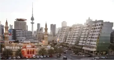  ??  ?? KUWAIT: The Sawaber Complex (right) in downtown Kuwait City. —Photo by Athoob Al-Shuaibi