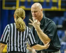  ??  ?? Green Bay Phoenix head coach Kevin Borseth makes a point to an official.