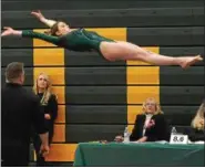  ?? TANIA BARRICKLO — DAILY FREEMAN ?? Roosevelt’s Shannon Kelly finished first on the vault with an 8.525 score.