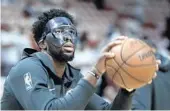  ?? LYNNE SLADKY/AP ?? The 76ers coaches liked what they saw from center Joel Embiid in their shootaroun­d Thursday and upgraded him.