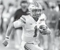  ?? CHRIS O’MEARA/AP ?? Ohio State quarterbac­k Justin Fields might appeal to a team that wants to trade for the Dolphins’ spot in the draft order.