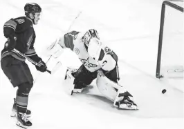  ?? TAYA GRAY/THE DESERT SUN ?? Coachella Valley Firebirds forward Cameron Hughes (19) scores in overtime for the win against the Texas Stars at Acrisure Arena in Palm Desert on Wednesday.