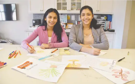  ?? PHOTOS: LETTERS AGAINST ISOLATION ?? Boston sisters Saffron, left, and Shreya Patel founded Letters Against Isolation, which has sent more than 14,000 cards to seniors.