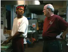  ??  ?? Jevon (Shane Paul McGhie) takes over from venerable fast food worker Stan (Richard Jenkins) who is pulling his last graveyard stint after 38 years in the business, in Adam Cohn’s “The Last Shift.”